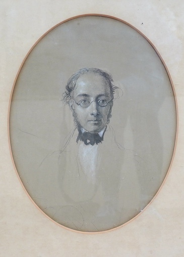 Late 19th century, oval heightened charcoal, Portrait of a gentleman, unsigned, 37 x 27cm. Condition - fair